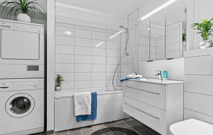 Banys amb rentadora integrada: com ocultar-la sense perdre funcionalitat - Esteve Estudi Cuina i Bany - Sabadell